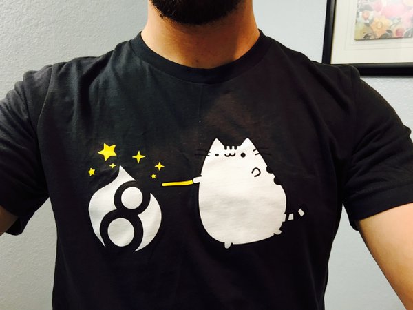 Pantheon shirt with Drupal 8 logo and cat holding magic wand